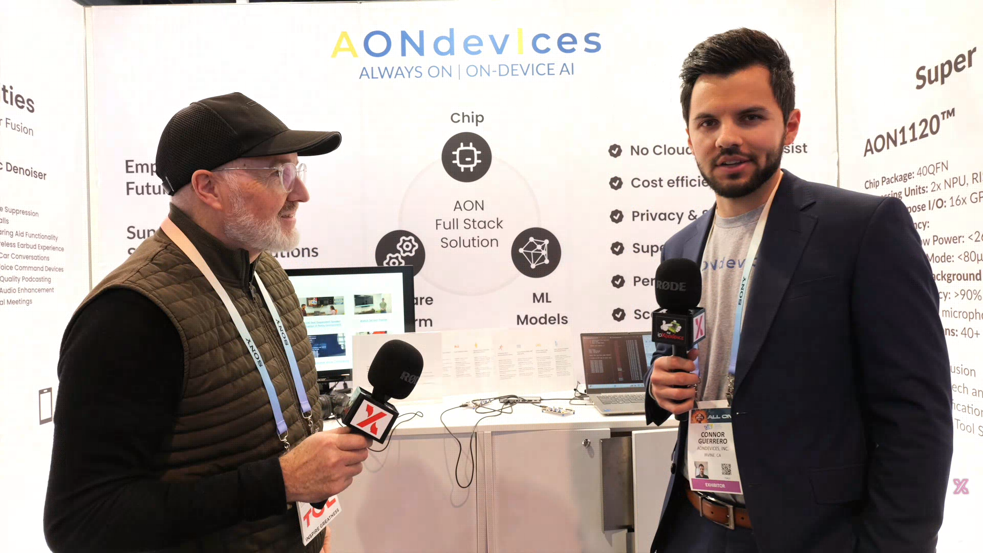 Connor Guerrero being interviewed at AONDevices booth about AI hardware technology